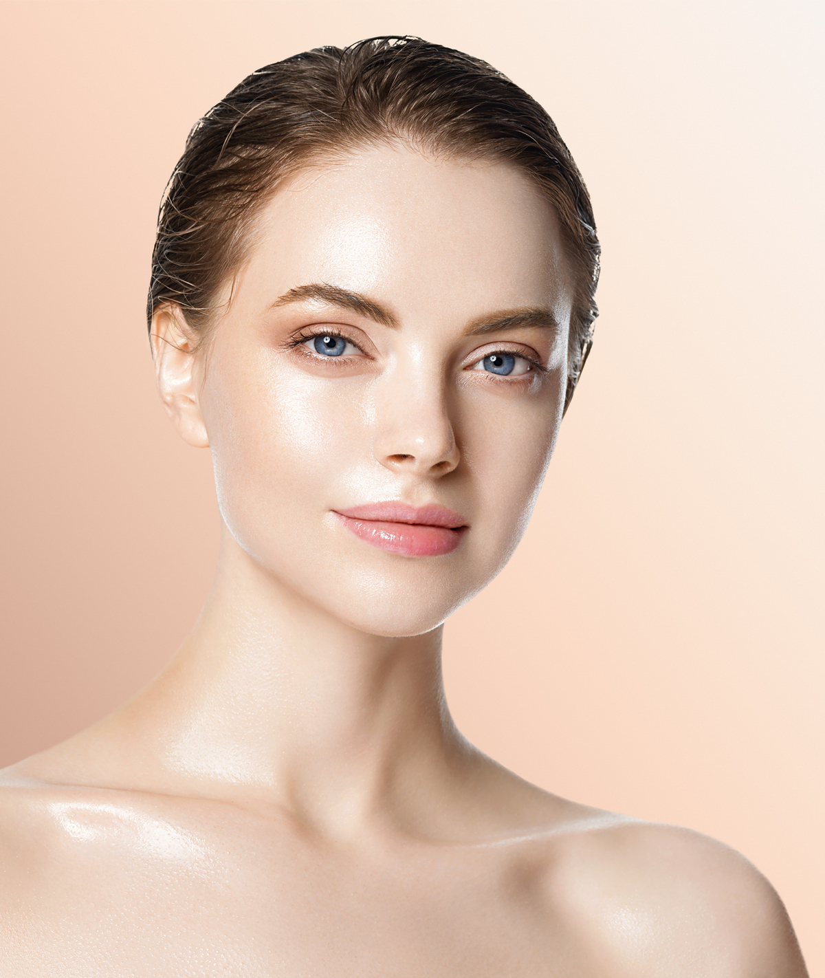 woman with glassy skin smiling